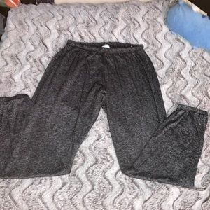 Grey pajama sweatpants, no draw strings, has two small pockets on the back